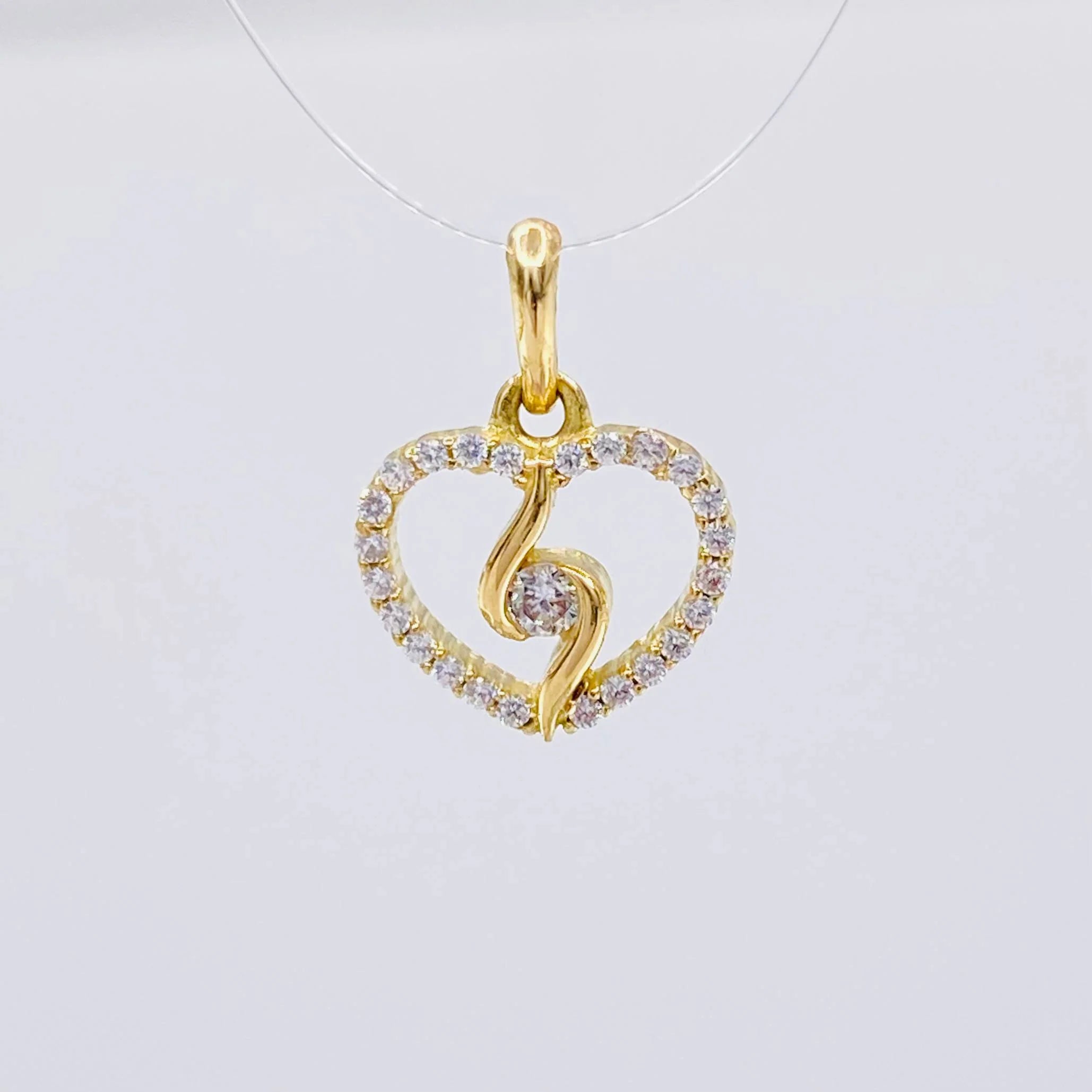 Dije Silueta Espiral 0.95g / 1.3cm Oro Amarillo 18K