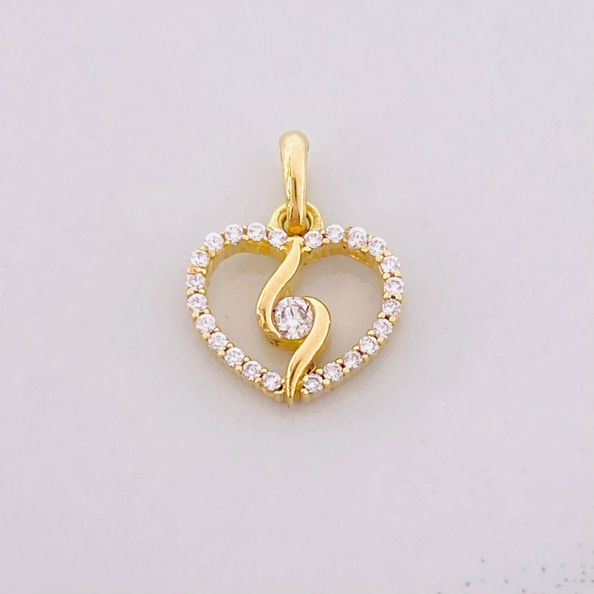 Dije Silueta Espiral 0.95g / 1.3cm Oro Amarillo 18K