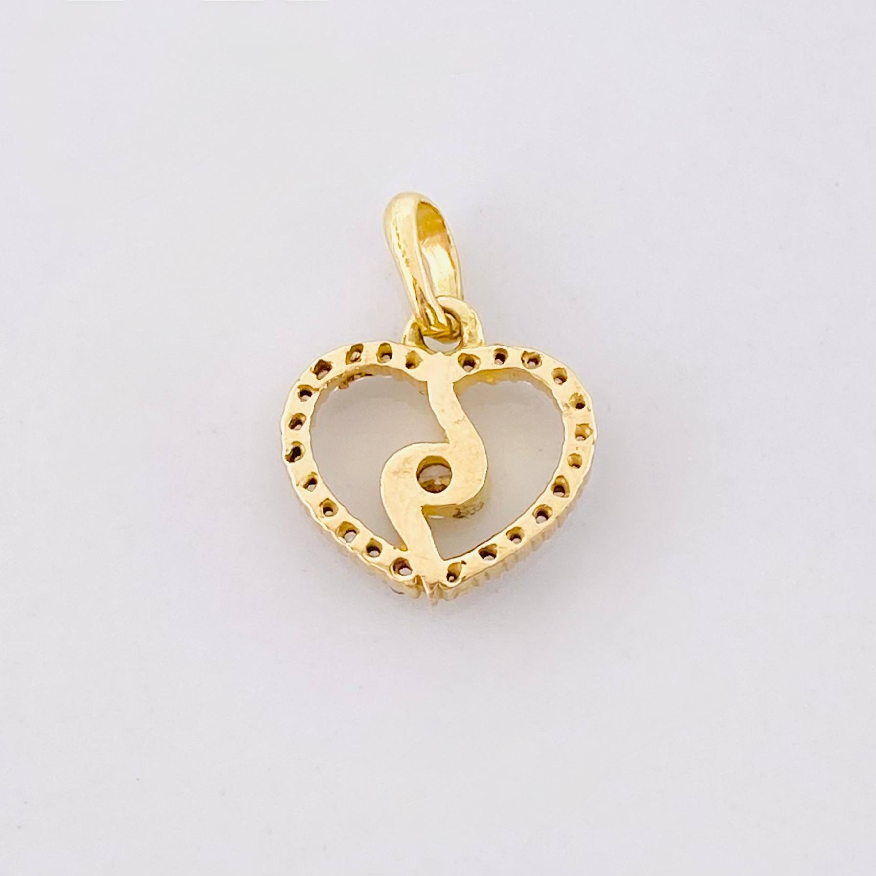Dije Silueta Espiral 0.85g / 1.3cm Oro Amarillo 18K