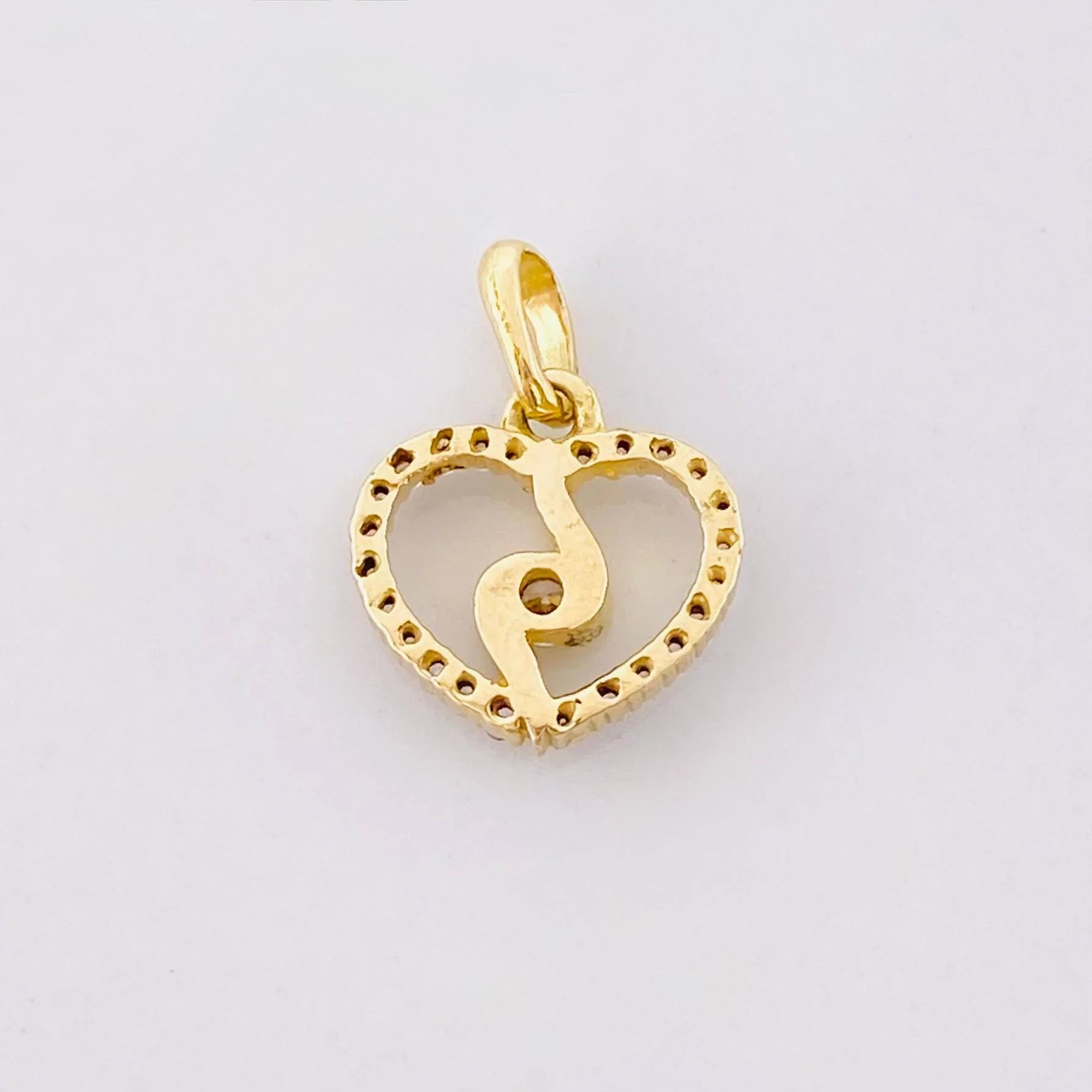 Dije Silueta Espiral 0.95g / 1.3cm Oro Amarillo 18K