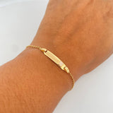 Pulso Bebe Aro Seguido 1.45gr / 14.4cm / 1.4mm Placa Rectangular Trebol Blanco Oro Amarillo 18K $