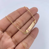Pulso Bebe Aro Seguido 1.5gr / 13.6cm / 1mm Placa Rectangular Trebol rosado Oro Amarillo 18K $