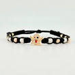 Pulsera Tejida Negra Herraje Fantasma / Bolas Lisas 8Und 4Mm- Bola Diamantada 6Und 3Mm Tres Oros 18K