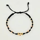 Pulsera Tejida Negra Herraje Fantasma / Bolas Lisas 8Und 4Mm- Bola Diamantada 6Und 3Mm Tres Oros 18K