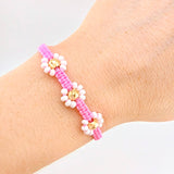 Pulsera Tejida Rosada Trio Flores 3 und 5mm Oro Amarillo 18K