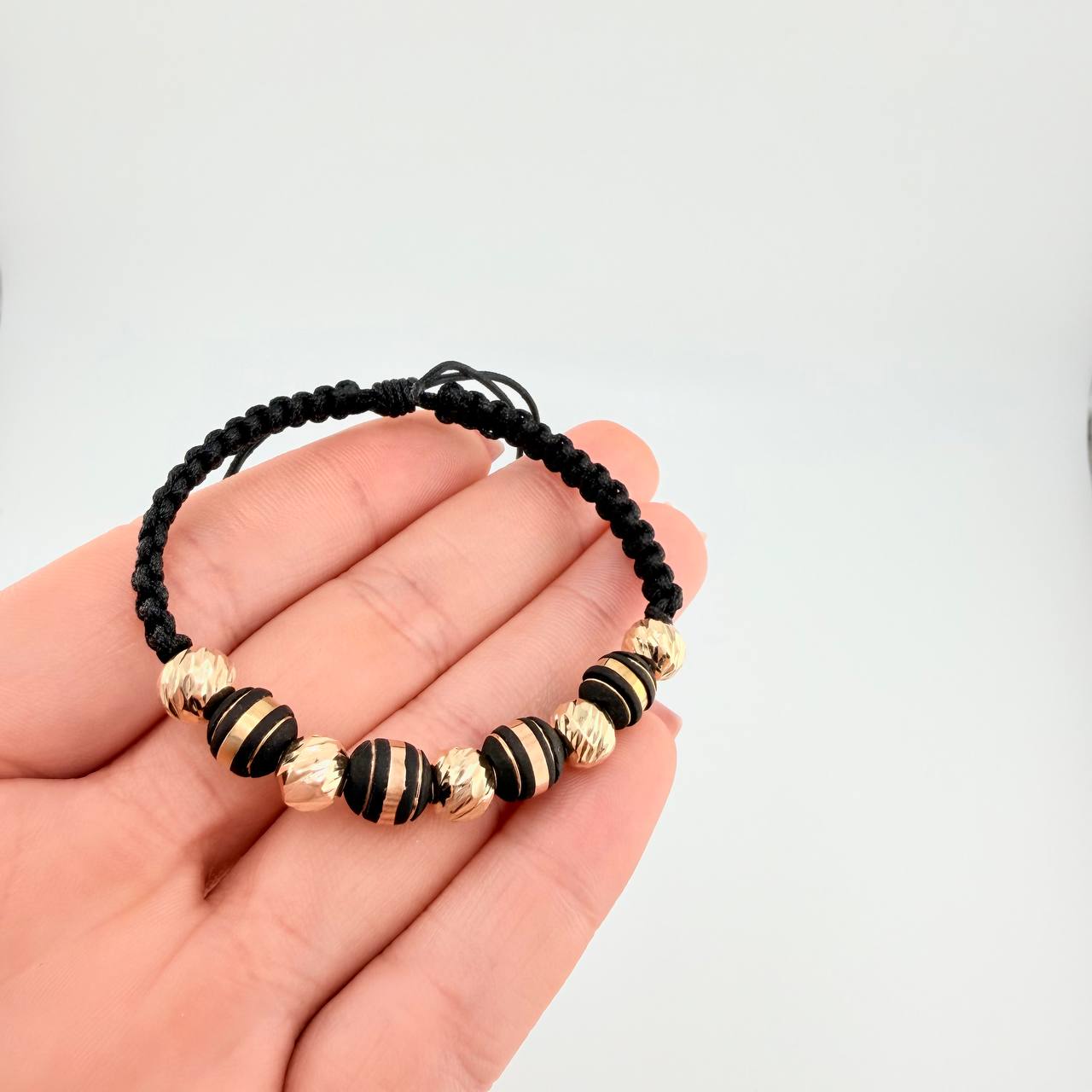 Pulsera Tejida Negra Neoros 4 Und / 5 Und 7Mm Diamantados Oro Amarillo 18K