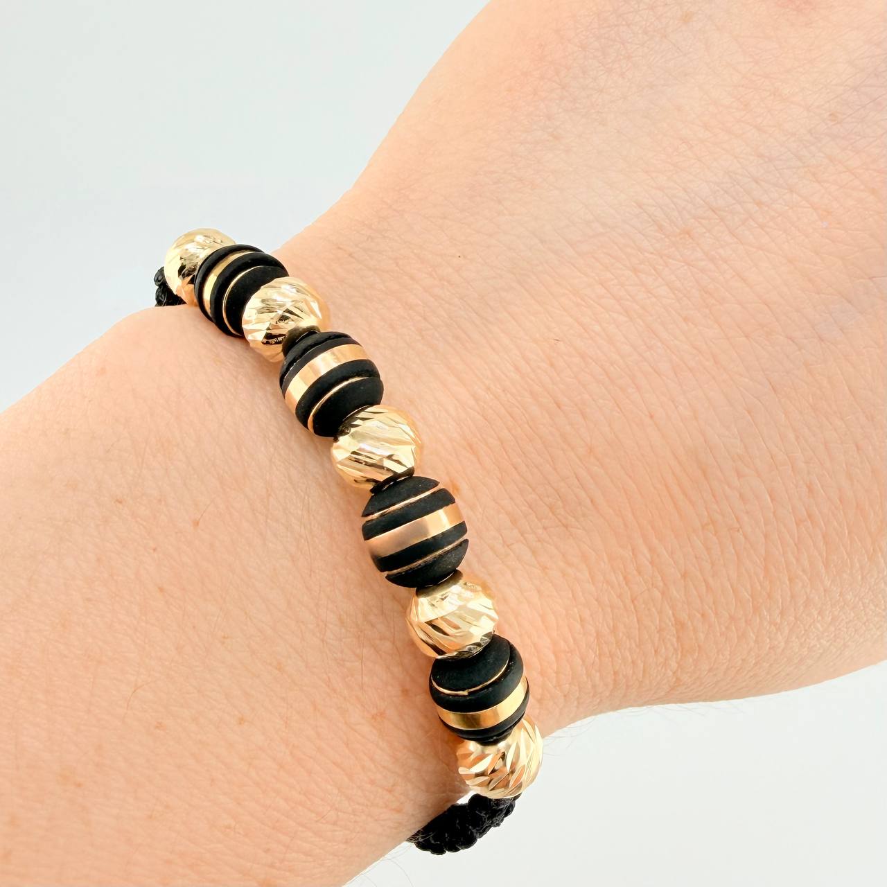 Pulsera Tejida Negra Neoros 4 Und / 5 Und 7Mm Diamantados Oro Amarillo 18K