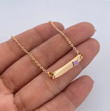 Pulso Bebe Aro Seguido 1.45gr / 15cm / 1mm Placa Rectangular Trebol Morado Oro Amarillo 18K $