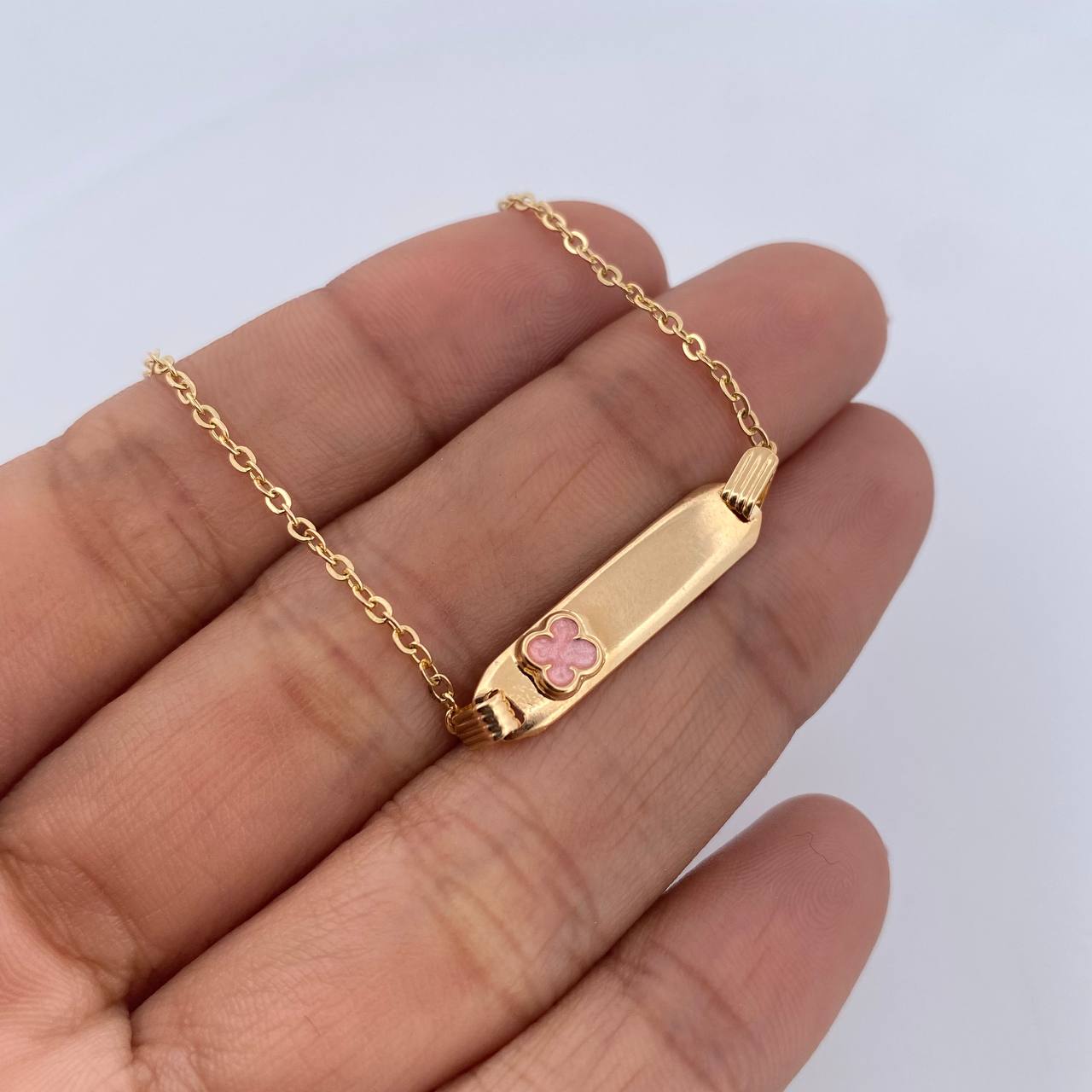 Pulso Bebe Aro Seguido 1.4gr / 14cm / 1mm Placa Rectangular Trebol Rosado Tornazol Oro Amarillo 18K $