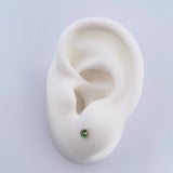 Topos Cuatro Garras 0.45gr / Circon Verde Oro Amarillo 18K &