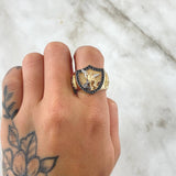 Anillo Escudo Arcangel San Miguel Cruz 7.05gr / T9 1/2 / Circones Negros Blancos Oro Amarillo 18K ©