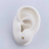 Topos Bisel 0.4gr / Circon Blanco Oro Amarillo &