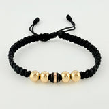 Pulsera Tejida Negra Neoro / 4 Und 6Mm Lisas Oro Amarillo 18K