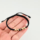 Pulsera Tejida Negra Neoro / 4 Und 6Mm Lisas Oro Amarillo 18K