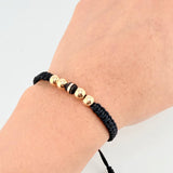 Pulsera Tejida Negra 1 Neoro / 2 Und 6Mm Diamantadas 2 Und 63Mm Lisas Oro Amarillo 18K