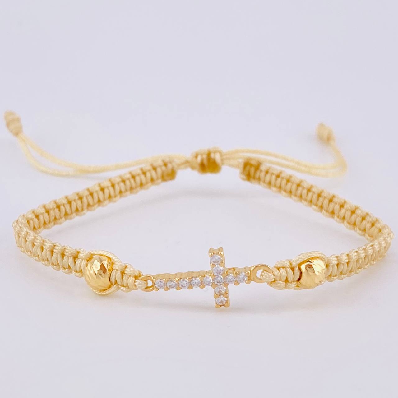 Pulsera Tejida Beige Cruz Maraquera Oro Amarillo 18K
