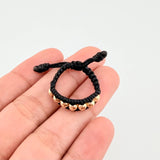 Anillo Tejido Negro Bolas Diamantadas 0.55 g / T7 Oro Amarillo 18K