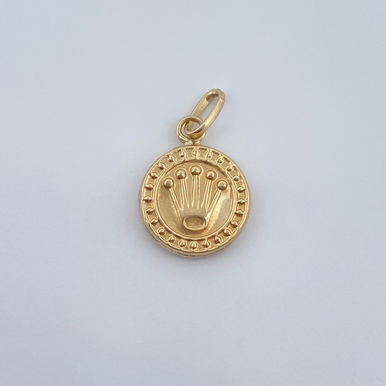 Dije Medalla Corona Rx 0.55gr / 1.9cm / Oro Amarillo 18K &