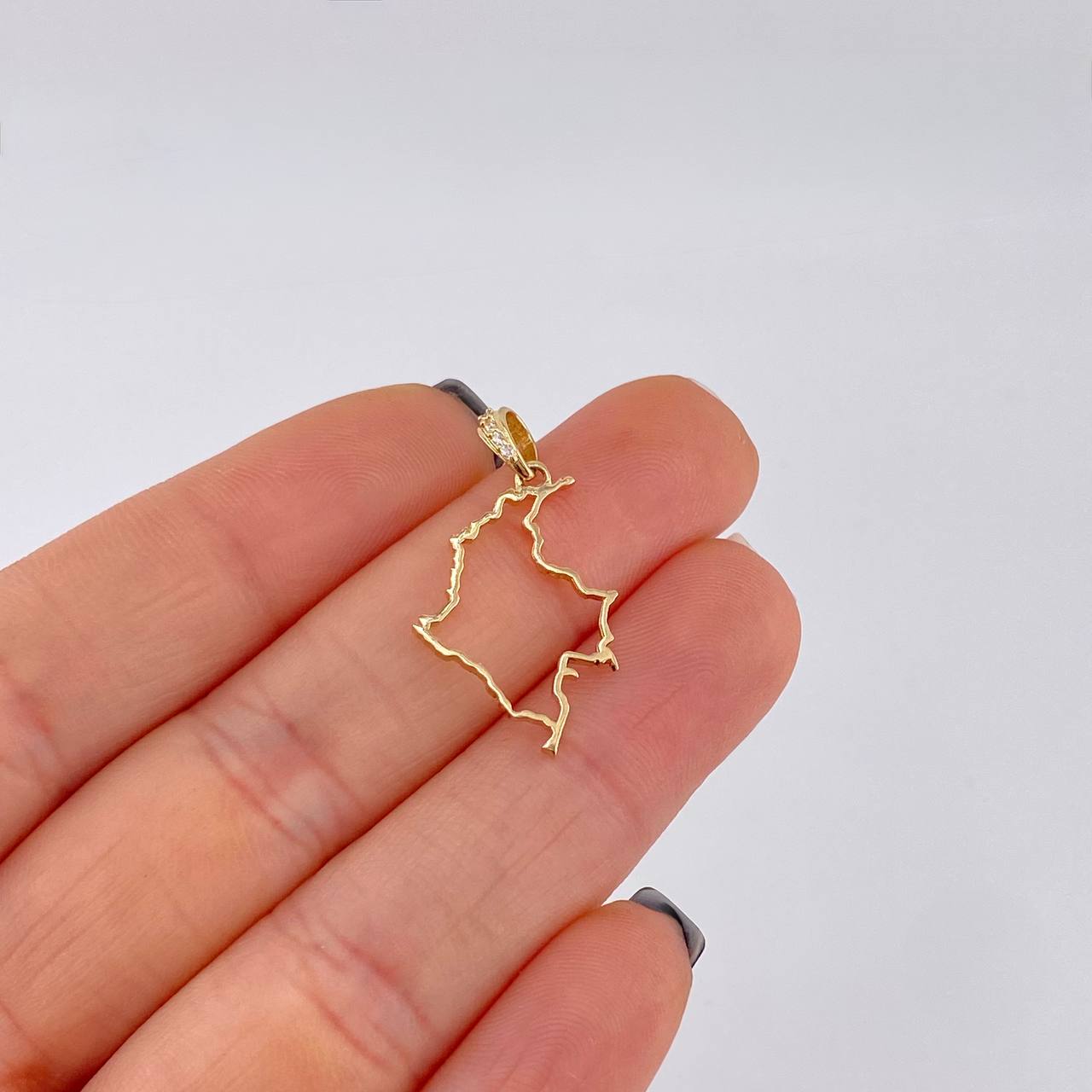 Dije Silueta mapa 0.95g / 2.7cm Oro Amarillo 18K