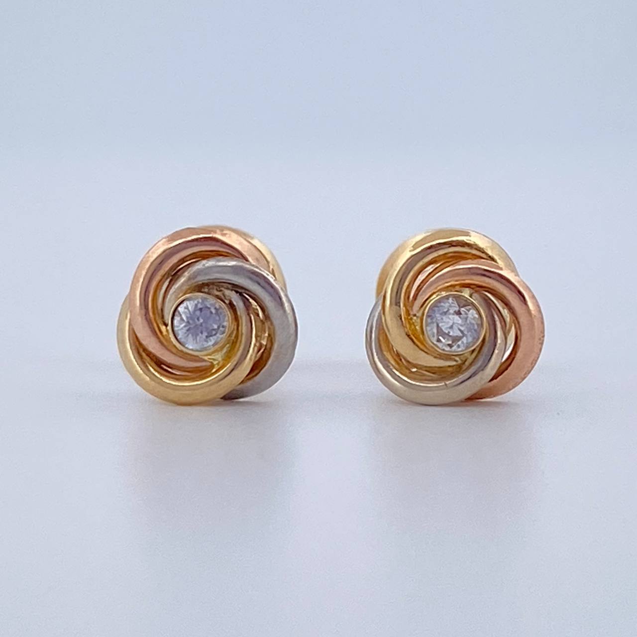 Topos Helice 0.7gr / Oro 18K $