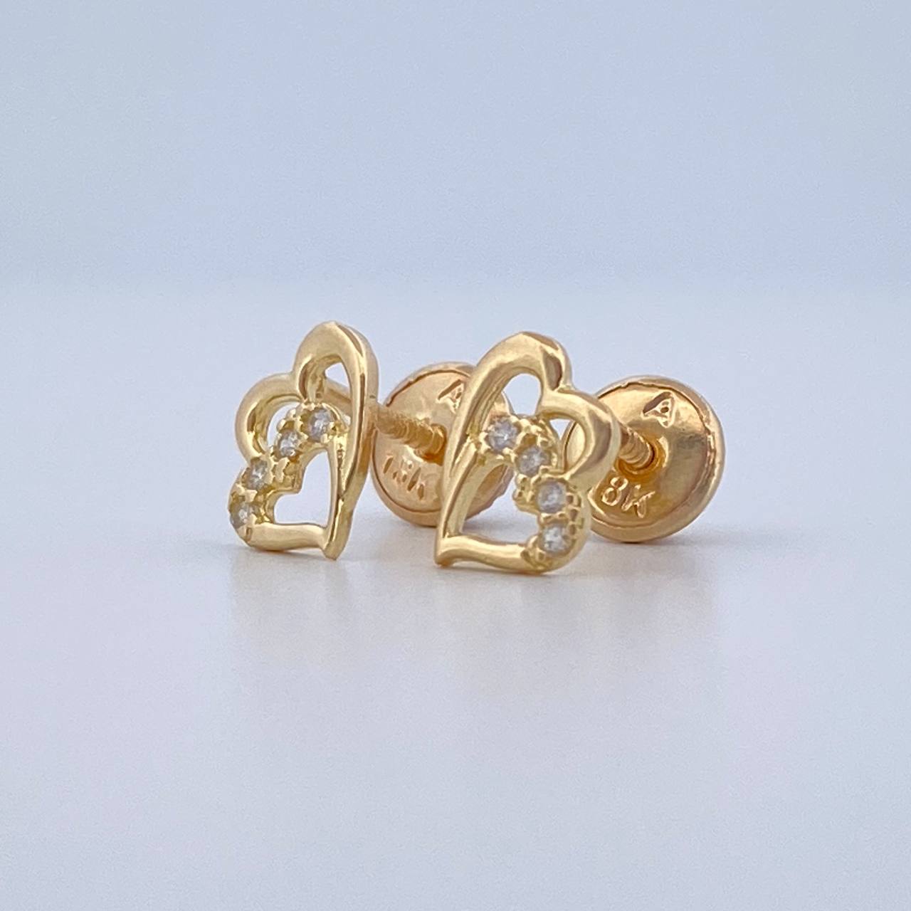 Topos Silueta Corazon Doble 0.85gr / Oro 18K $