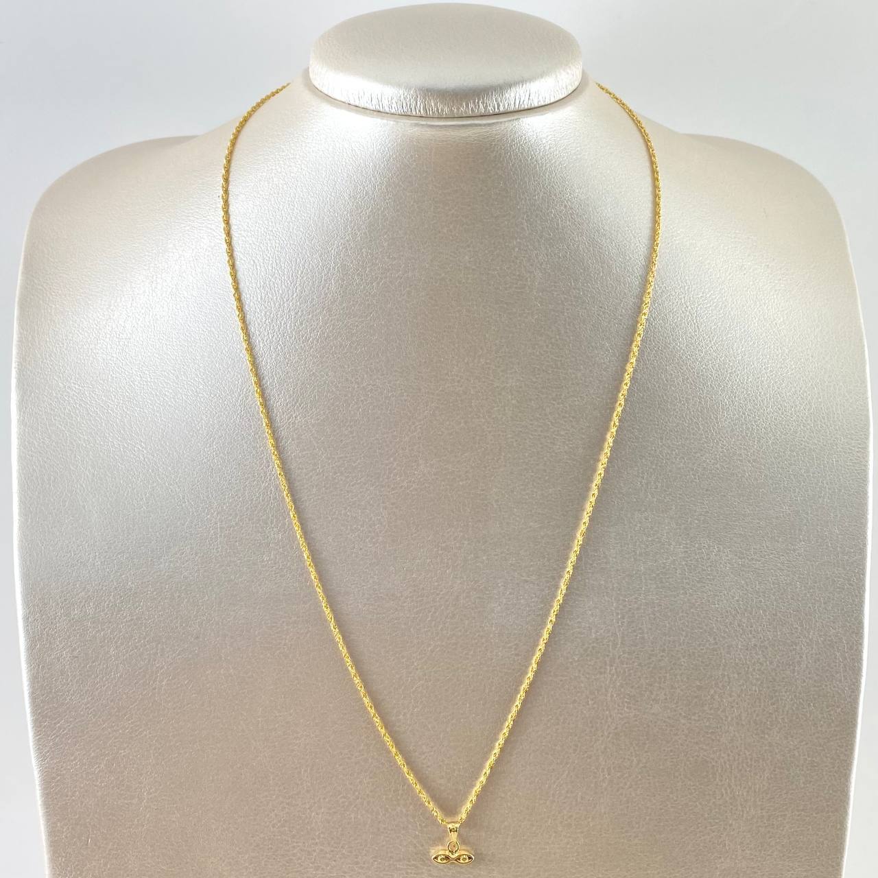 Set Cadena Lazo 1gr / 50cm / 1.2mm + Dije Ojos Santa Lucia 0.35gr / 1.1cm Mate 1.35gr Oro Amarillo 18K (Oferta) *