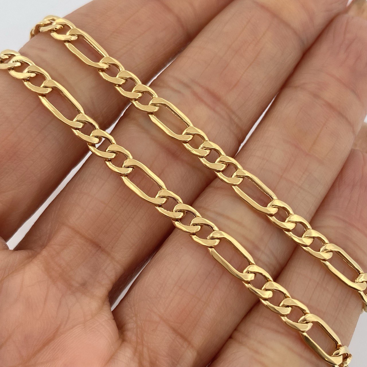 Cadena Figaro 8.5gr / 60.5cm / Oro Amarillo +1 18K +