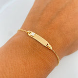 Pulso Bebé Aro Seguido 1.4gr / 14.2cm / Placa Rectangular Curva Trebol Blanco Oro Amarillo 18K &