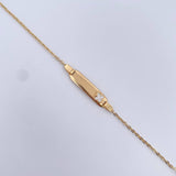 Pulso Bebé Aro Seguido 1.4gr / 14.2cm / Placa Rectangular Curva Trebol Blanco Oro Amarillo 18K &