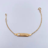 Pulso Bebé Aro Seguido 1.4gr / 14.2cm / Placa Rectangular Curva Trebol Blanco Oro Amarillo 18K &