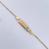 Pulso Bebe Aro Seguido 1.5gr / 15.1cm / Placa Rectangular Curva Trebol Azul Oro Amarillo 18K &