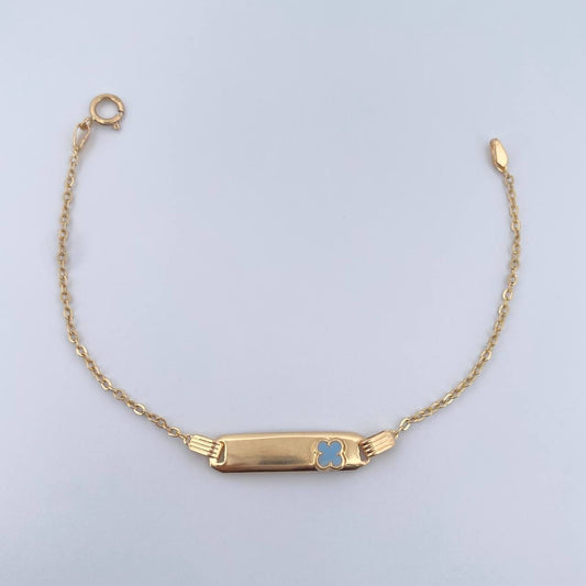 Pulso Bebe Aro Seguido 1.5gr / 15.1cm / Placa Rectangular Curva Trebol Azul Oro Amarillo 18K &