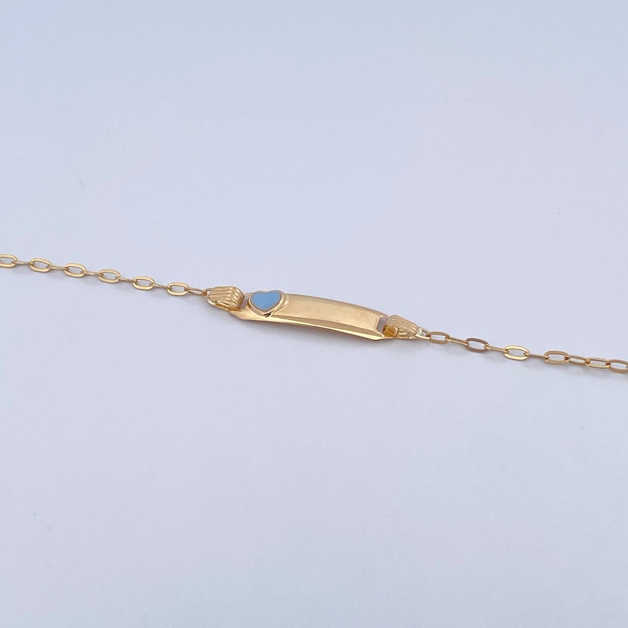 Pulso Bebé Cajon Corazon Celeste 1.45gr / 13.4cm-14.2cm / 1.5mm Placa Rectangular Curva Oro Amarillo 18K &