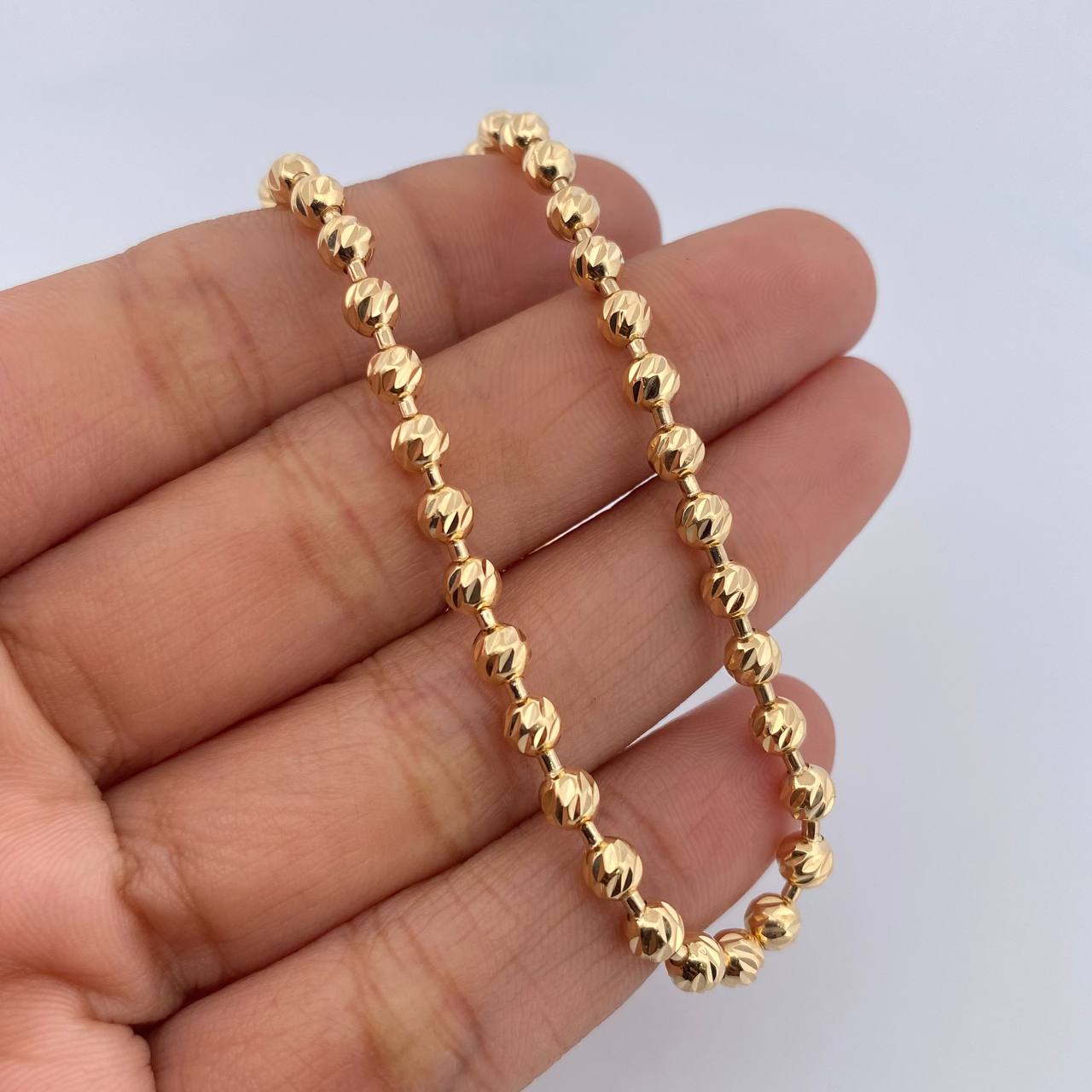 Cadena Militar 25.6gr / 59.5cm / 4mm Bolas Diamantadas Oro Amarillo 18K $