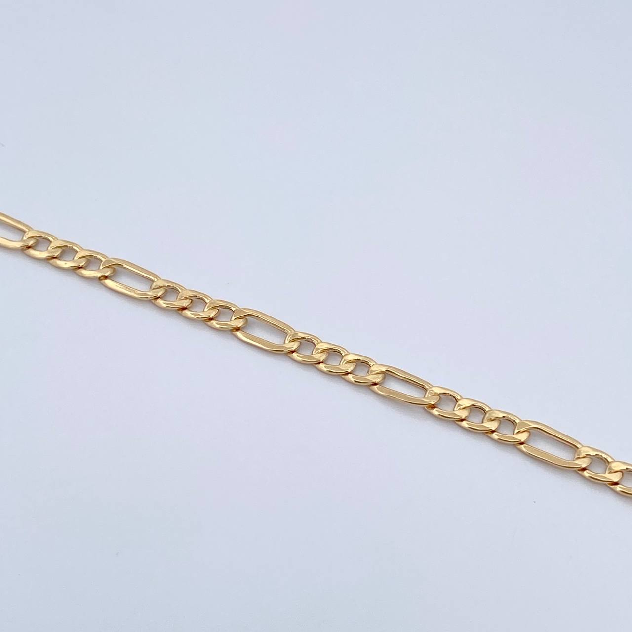 Pulso Figaro 2.9gr / 20cm / 4.4mm Oro Amarillo +1 18K $
