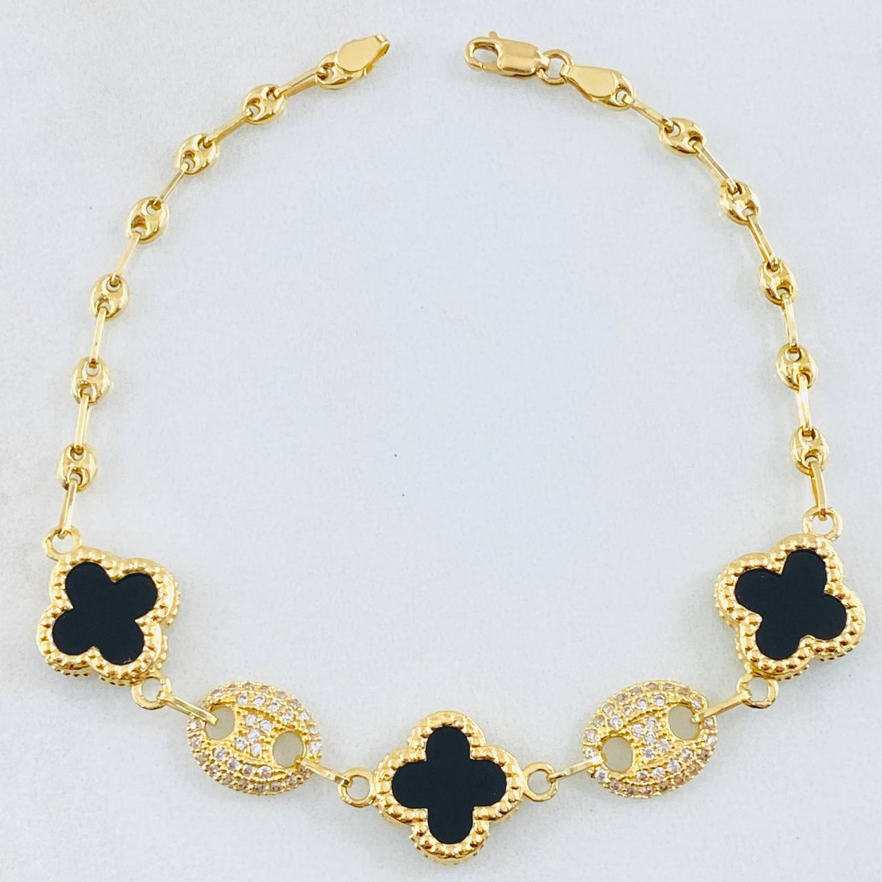 Pulso GC Trebol Negro-Dorado 6.35gr / 18.5cm / Oro Amarillo Nac.Esp. 18K