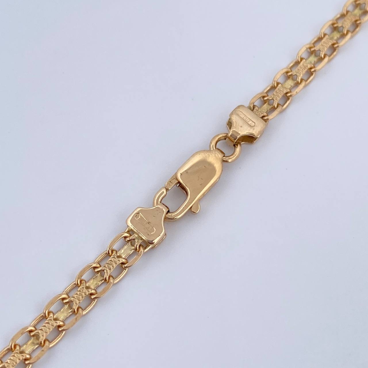 Cadena China 14.9gr / 61cm / +0 Oro 18K $