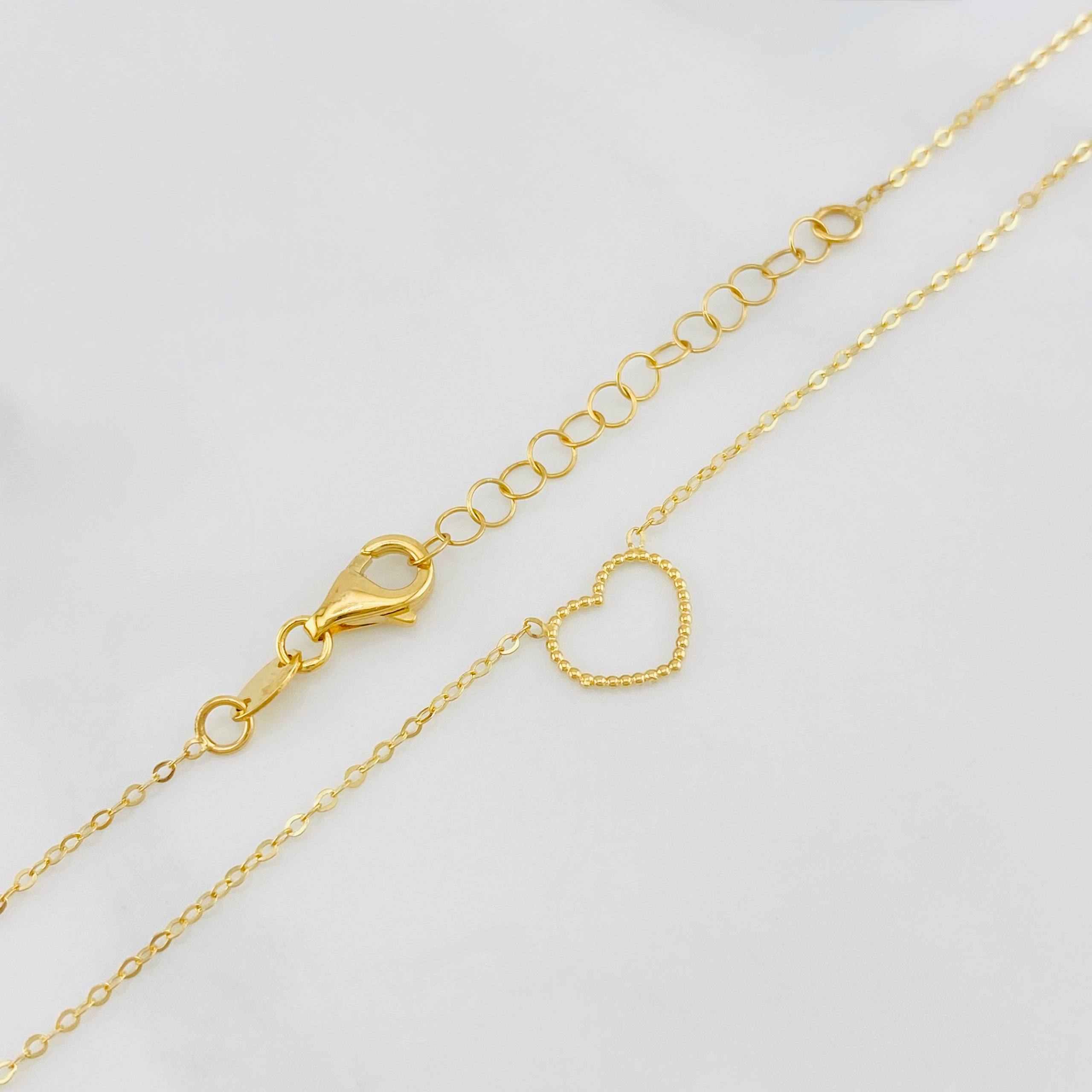 Cadena Aro seguido silueta corazón 1.3g / 45.5cm-42 cm / 1mm Oro Amarillo 18K