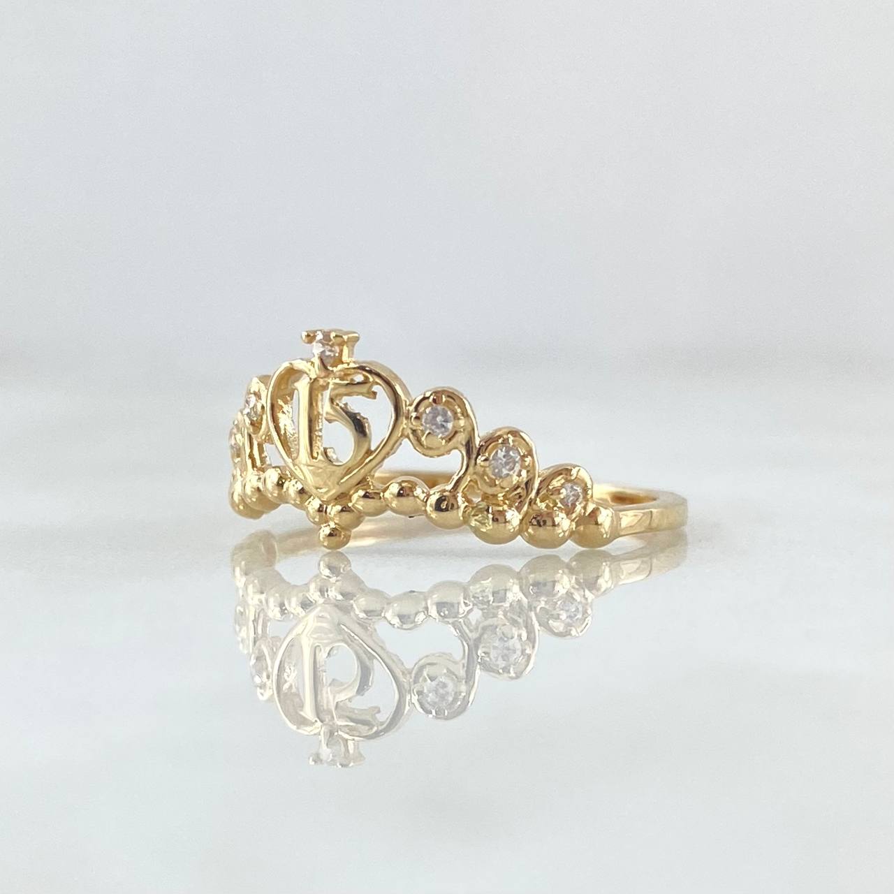Anillo 15s Corona Bizantina 1.8gr / T7 / Circones Blancos Oro Amarillo 18K ©