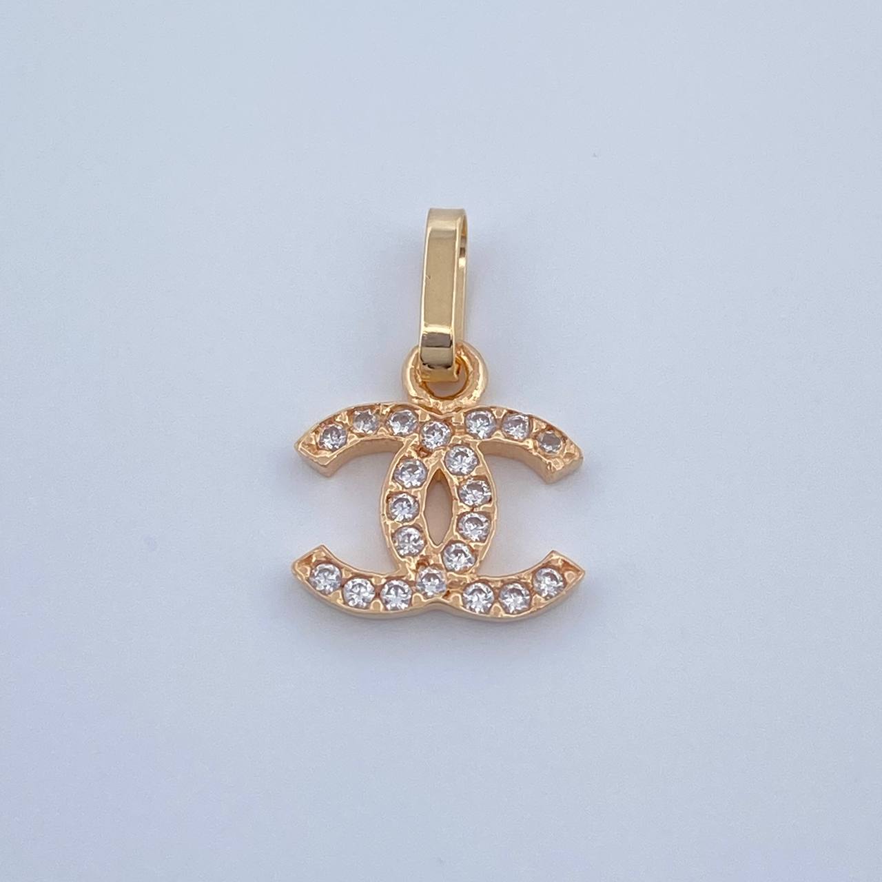 Dije Ola Cruzada 0.5gr / 1.5cm / Oro Amarillo 18K &