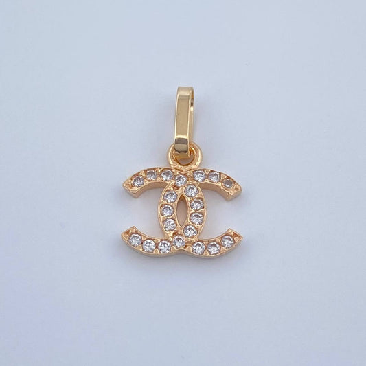 Dije Ola Cruzada 0.5gr / 1.5cm / Oro Amarillo 18K &