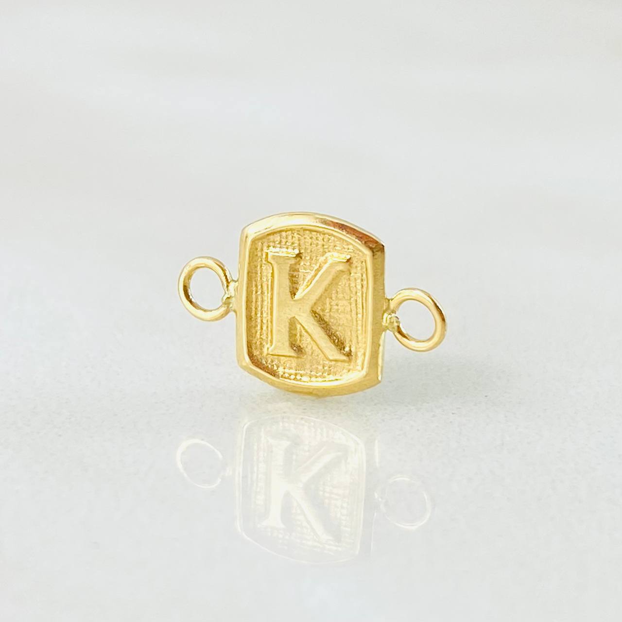 Herraje Letra K 0.25gr / 1.2cm / Oro Amarillo 18K