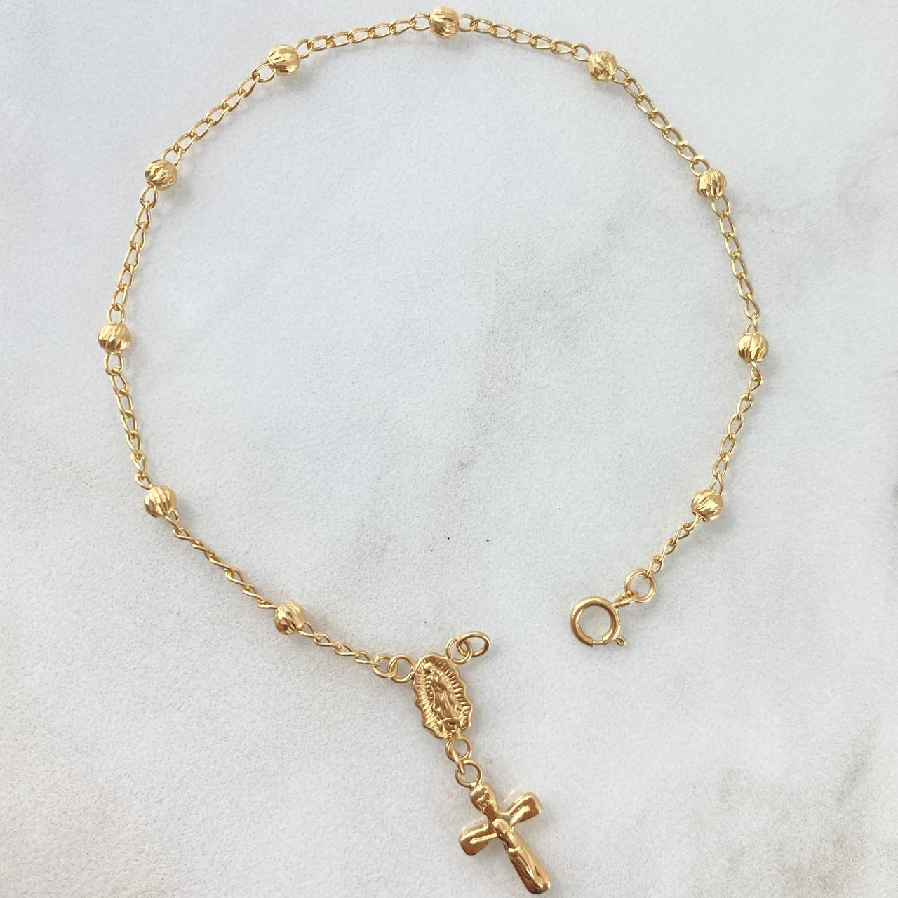 Pulso Denario Espiga 2.35gr / 18cm / 3mm Virgen
Guadalupe-Cruz Cristo Bolas Diamantadas Oro Amarillo 18K ©
