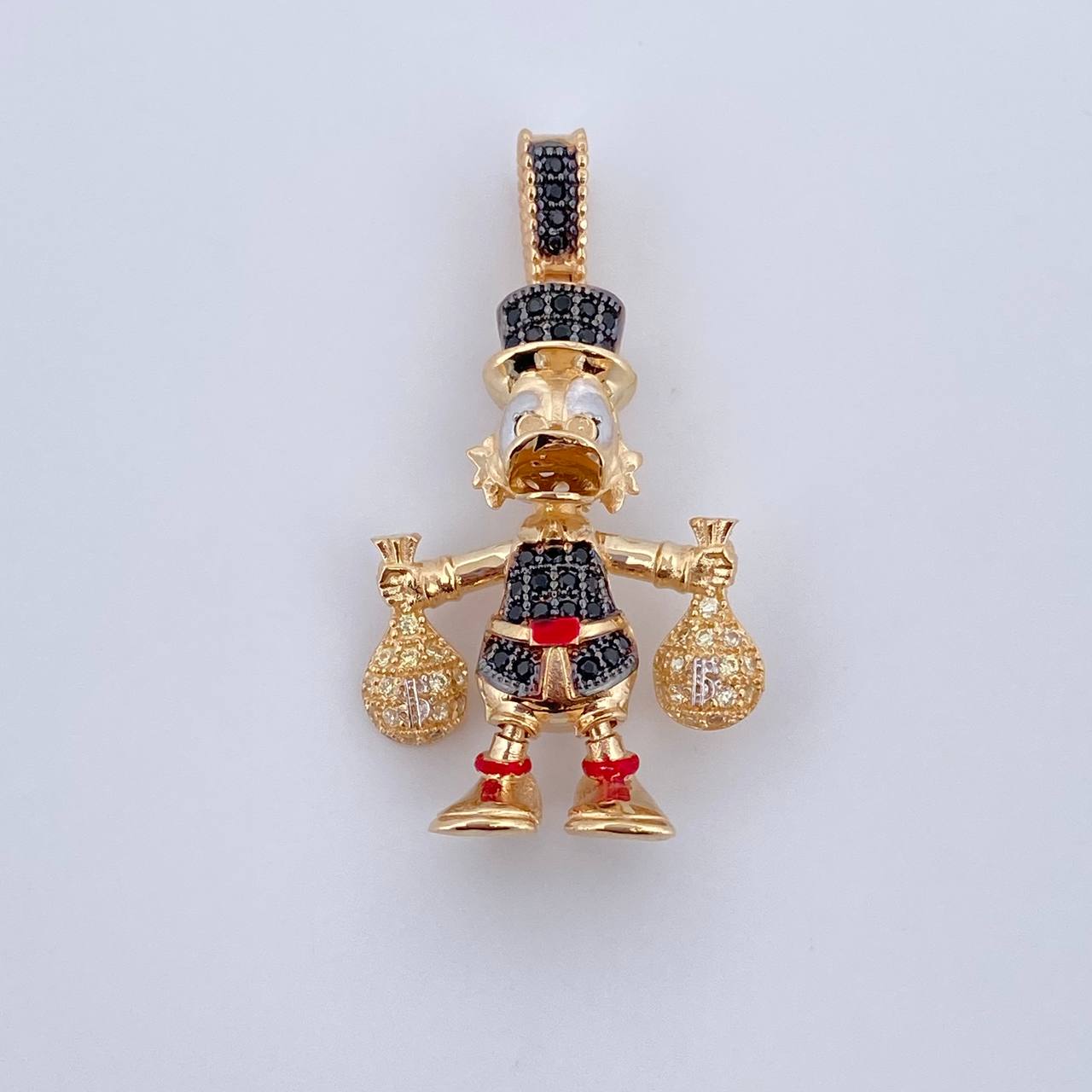 Dije Pato Bolsas Dinero 6.15gr / 3.5cm / Circones Negros Blancos Tres Oros 18K &