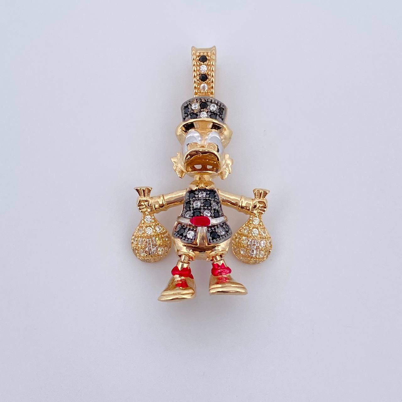 Dije Pato Bolsas Dinero 6.2gr / 3.5cm / Circones Negros Blancos Tres Oros 18K &