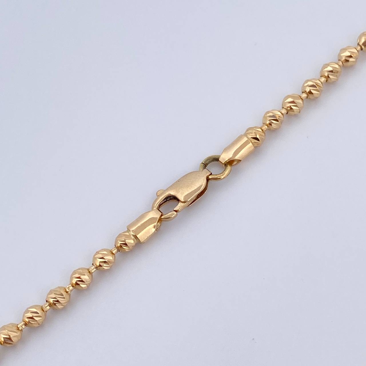 Cadena Rustica Corona RX Barril Militar 17.6gr / 62.5cm / 2.7mm Bolas Diamantadas Cauchos Negros Oro Amarillo 18K $