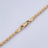 Cadena Rustica Corona RX Barril Militar 17.6gr / 62.5cm / 2.7mm Bolas Diamantadas Cauchos Negros Oro Amarillo 18K $