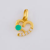 Dije Corazón Silueta 1.55gr / 1.8cm / Esmeraldas 18pts Diamantes Blancos 7pts Oro Amarillo 18K (Joya)