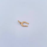 Dije Herradura 0.6gr / 1.7cm / Liso Oro Amarillo 18K $