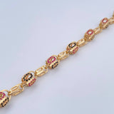 Pulso Rustico Ovalo  17.2gr / 20.3cm / 6.5mm Circones Fucsias Negros Oro Amarillo 18K $